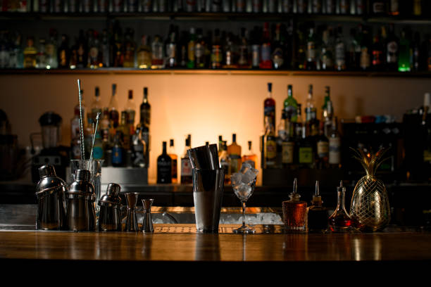 istock beautiful composition with bar equipment and steel tools which stand on bar counter. 1403513768