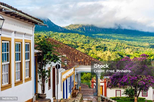 Historic Colonial Houses With The Mountain And Forest Vegetation In Tiradentes City Stock Photo - Download Image Now