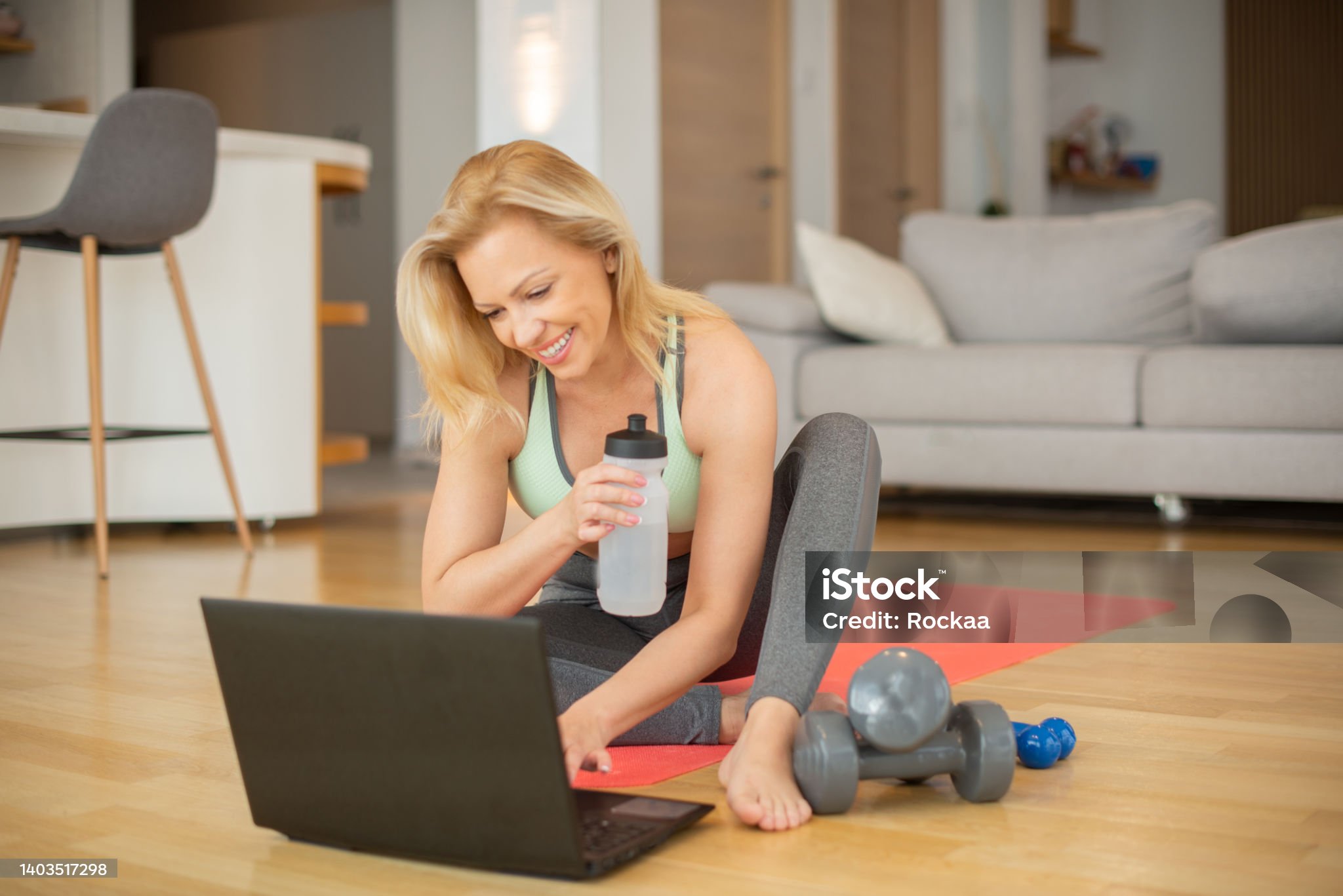 A middle-aged woman who exercises at home