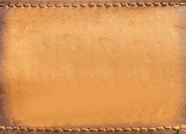 istock Blank leather jeans label sewed, background, mock up 1403519011