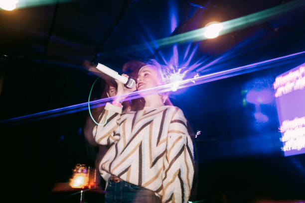istock Friends Night Out At Karaoke Dance Bar 1403519057