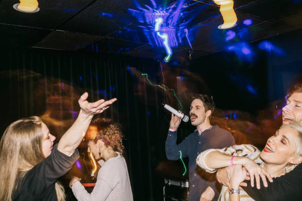 istock Friends Night Out At Karaoke Dance Bar 1403519680