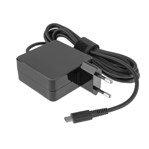 istock laptop power adapter, laptop spare part, on a white background, angled side view 1403520136