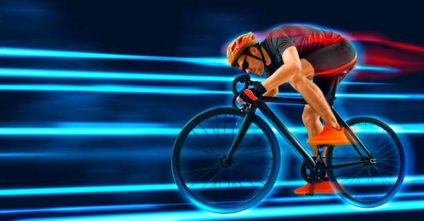 istock Man racing cyclist in motion on blue neon background 1403521818