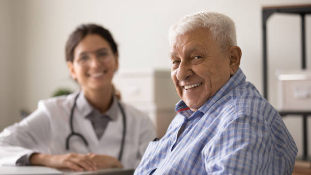 istock Happy optimistic senior man looking at camera with toothy smile 1403523144