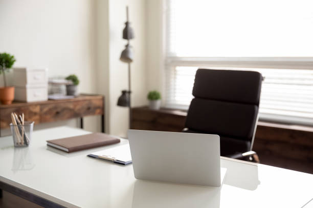 istock Businessperson empty office workplace with no people 1403523738