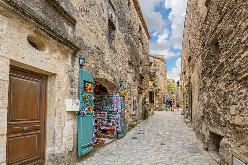 Colorful doors on shops inside the medieval old town of Les-Baux-de-Provence in the Alpilles mountains of Southern France.