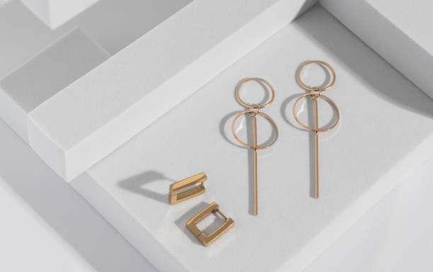 istock Modern geometric shape earrings on geometric white background 1403525196