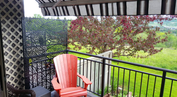 istock Comfortable Patio With Next Door Neighbor Privacy Screen 1403528796