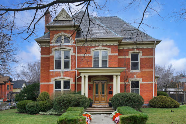 Ontario, Canada - March 24, 2020:  Large old fashioned two story house with portico entrance