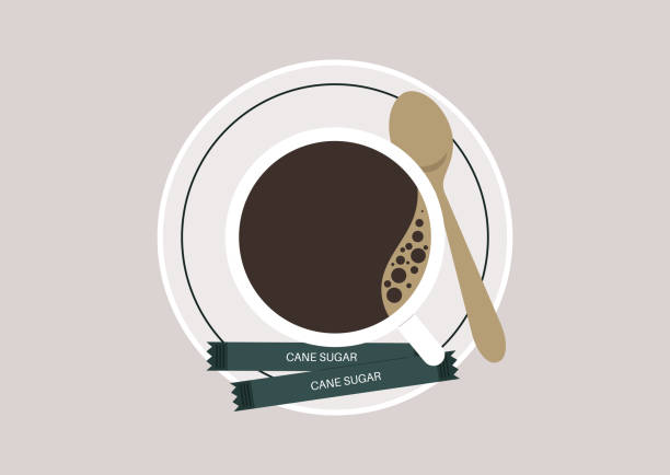 istock A top view of a cup of black coffee on a saucer with cane sugar packets 1403536509