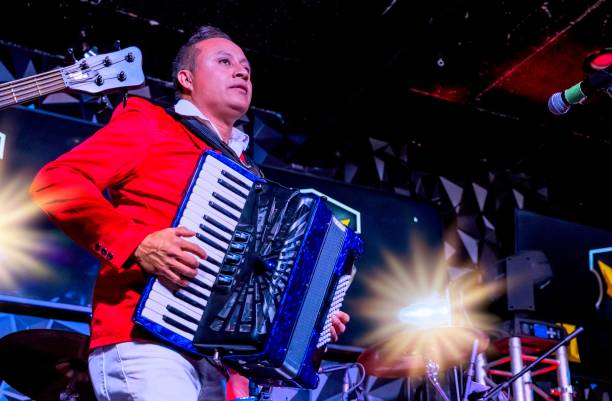 Hispanic accordionist performing in a concert