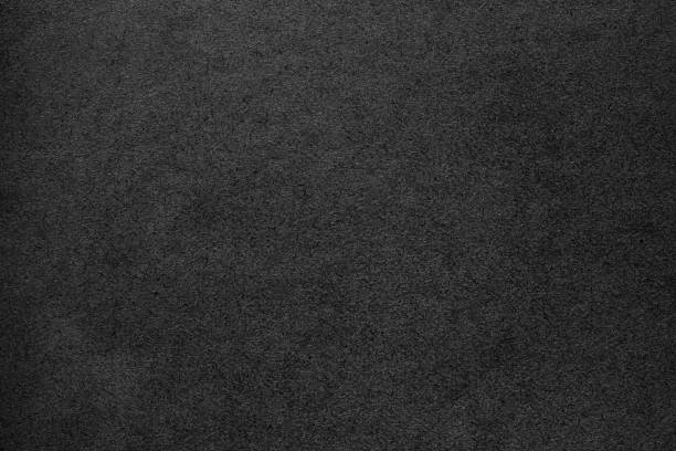 istock black background, paper texture similar to concrete wall 1403537292