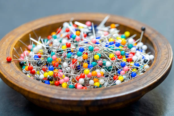 Colorful thumbtacks close up for background