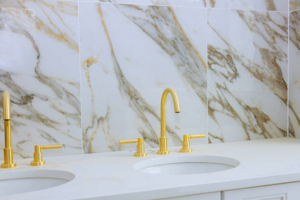 istock Bathroom with marble sink and shower curtain. 1403539791