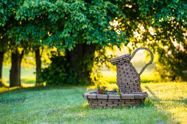 Wooden pot in the garden at golden hour somewhere in Lithuania.
