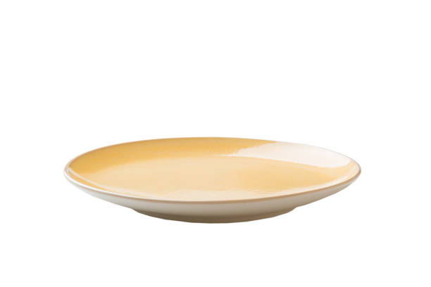 istock Yellow ceramic round plate isolated over white background. perspective view 1403551837