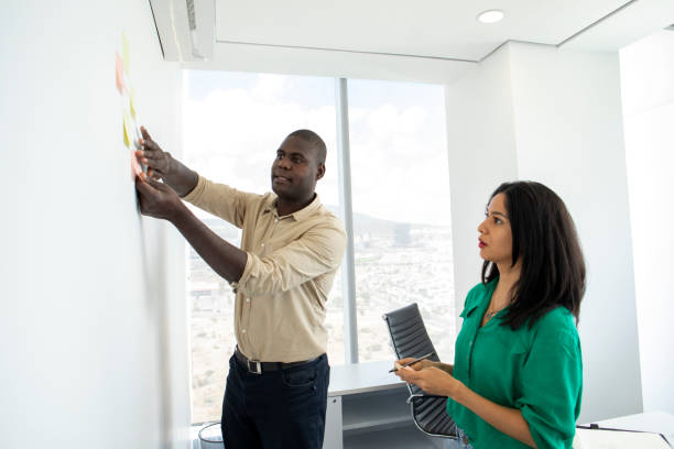 istock coworkers in the office 1403552789