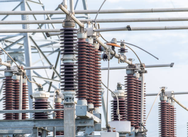 istock Many high voltage electrical insulators in power substation ,Energy supply to the community 1403554549