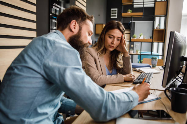 istock Two business partners writing up a plan for upcoming project 1403555070
