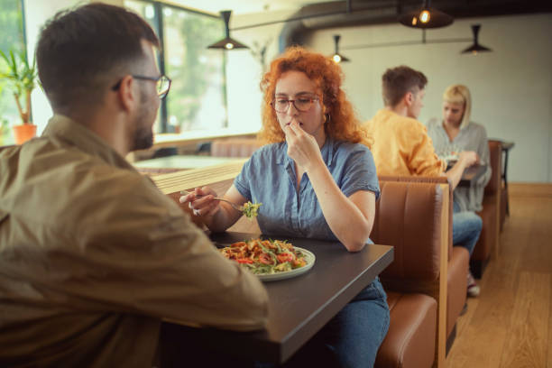 istock Best friends chatting over lunch together at a restaurant. 1403555766