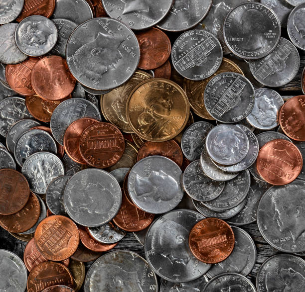 istock Background of American coins in filled frame 1403559945