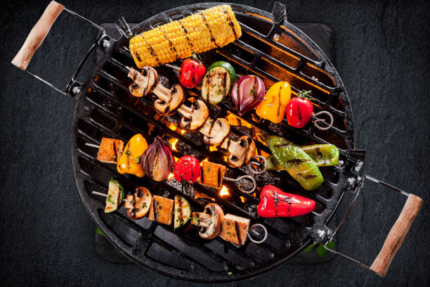 Barbecue vegetable and meat grill baked on plate stone