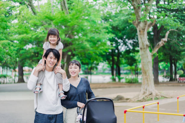 istock Walking in the park with children 1403568744