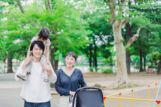 istock Walking in the park with children 1403568746