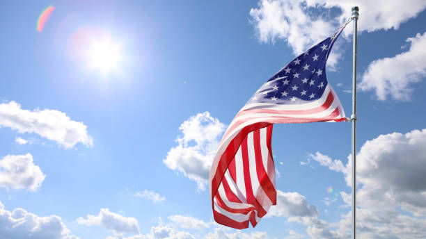 istock American flags on sky background. Independence Day concept. USA holiday. 1403575302