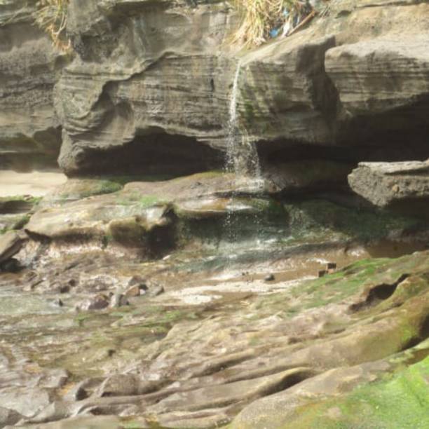 istock natural stone out of water 1403578300