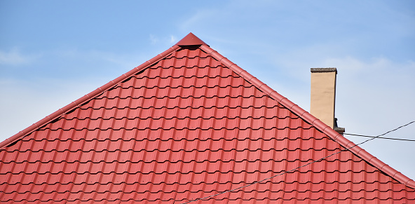 Roof of a house against sky