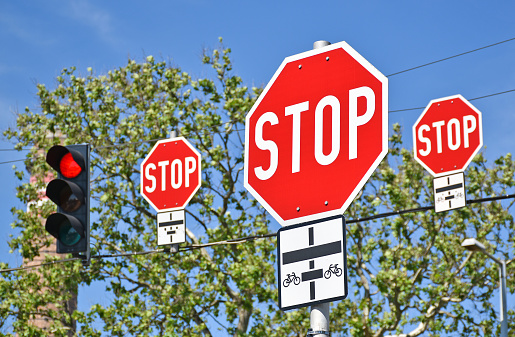 Stop signs at the road crossing