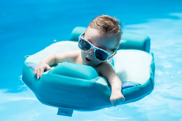 istock baby in the pool 1403600466