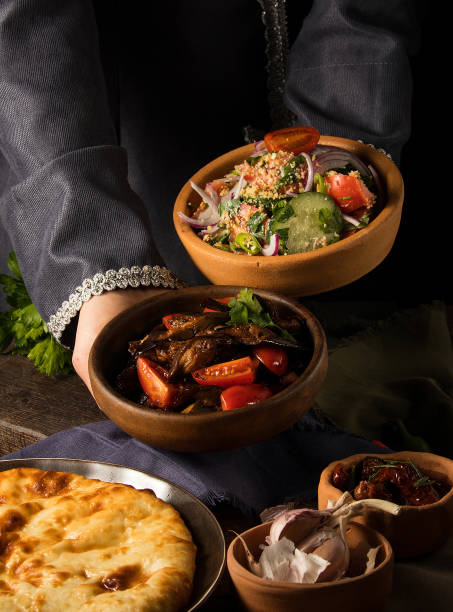 istock Person putting dishes on the table 1403601774