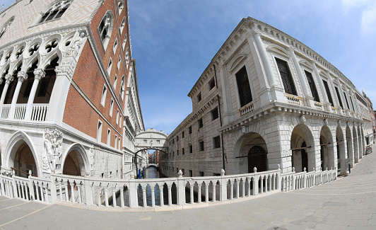 Venice, VE, Italy - May 18, 2020: Incredible e very rare view of  bridge of sighs and Ducal Palace without people during lockdown by Covid-19 with fisheye lens