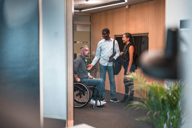 istock Mixed Race Group Of Colleagues Arriving In The Office 1403608176