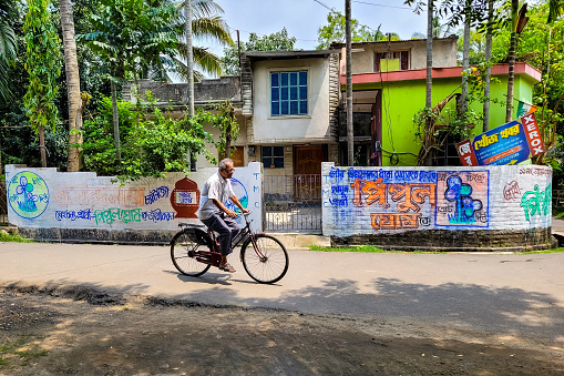 May 20, 2022 - Katwa WB India : Taken this picture of the own center and main municipality office of small town of Katwa West Bengal India. Due to severe summer heat the streets are deserted.