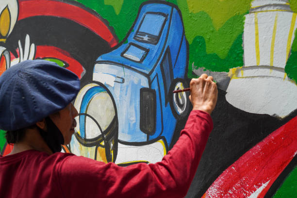 Banda Aceh, Indonesia - June 18, 2022:  22 mural art participants livened up the 76th Bhayangkara Day, in a mural competition held by the Aceh Regional Police