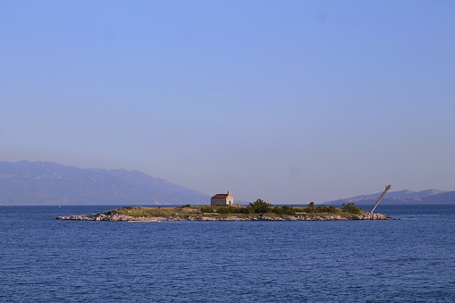 a little church on a little island in the croatian sea