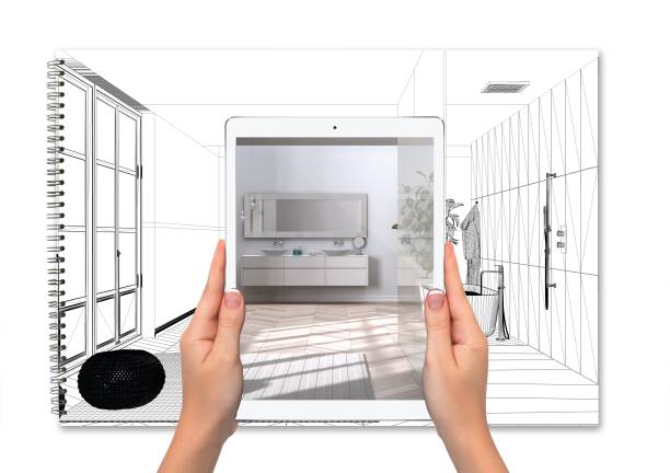 istock Hands holding tablet showing minimal luxury bathroom, total blank project background, augmented reality concept, application to simulate furniture and interior design products 1403619736