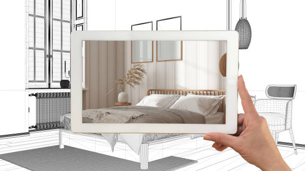 istock Augmented reality concept. Hand holding tablet with AR application used to simulate furniture products in custom architecture design, black ink sketch, bedroom project idea 1403619783
