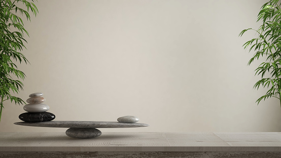 Empty interior design concept, feng shui, zen idea, wooden vintage table or shelf with marble stone balance over blank white background copy space