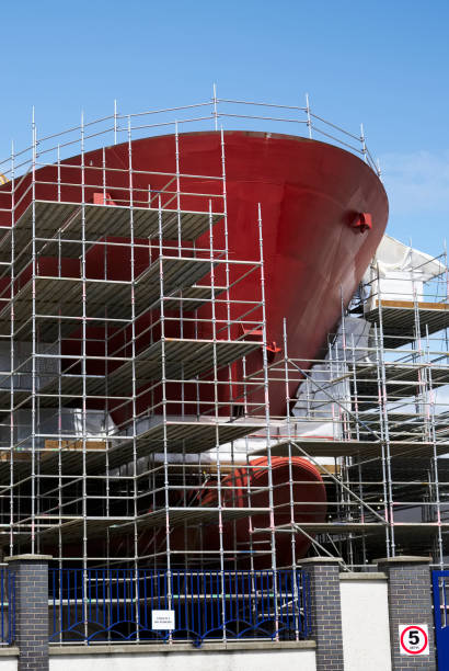 istock Shipbuilding and crane during ferry construction surrounded by scaffold 1403621557