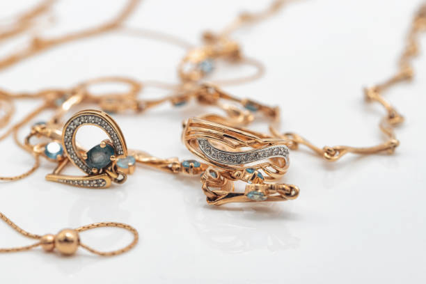 istock A gold chain with a pendant and a Topaz ring 1403623143
