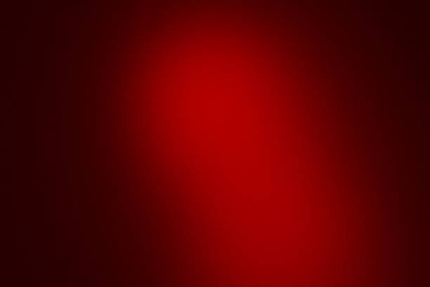 istock Abstract burgundy background with a light spot. 1403623719
