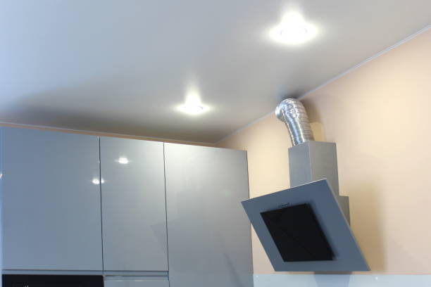 istock An electric hood hangs from the ceiling. 1403624323