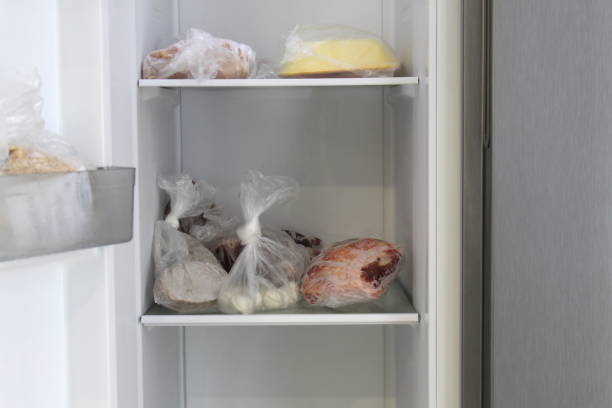 istock View of the open refrigerator with food. 1403624871