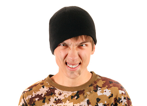 Angry Young Man with Dirty Face on the White Background