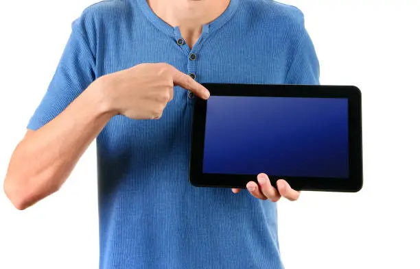 Person shows a Tablet Computer on the White Background closeup